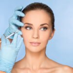 Beauty woman giving botox injections.