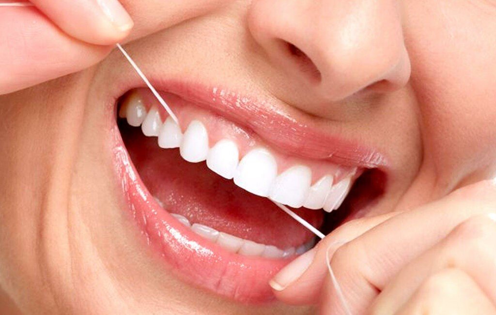 Floss Daily to Keep Gums Healthy